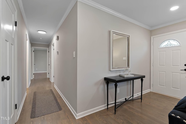 2704 Ross Rd, Durham, NC 27703 - entrance foyer featuring wood finished floors, ornamental molding, and baseboards