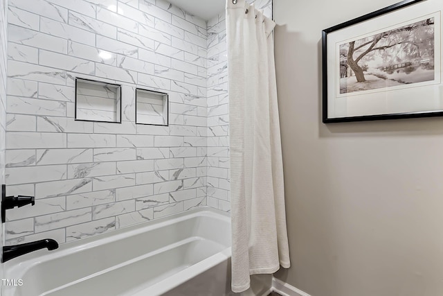 2704 Ross Rd, Durham, NC 27703 - full bathroom with shower / tub combo and baseboards