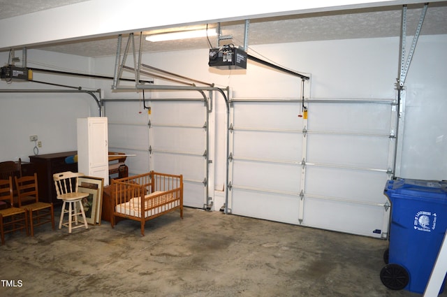 garage featuring a garage door opener