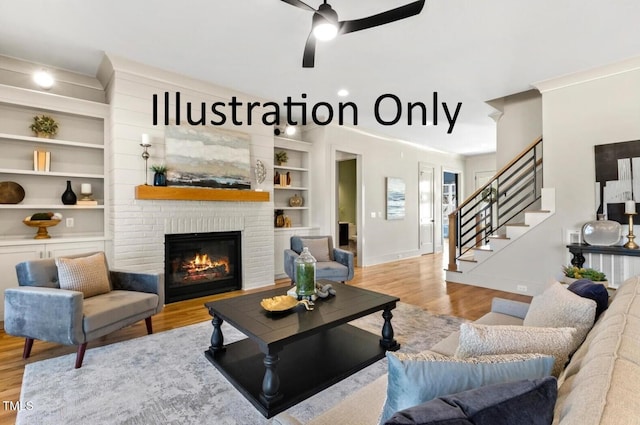 living room featuring a fireplace, built in shelves, and light wood-type flooring