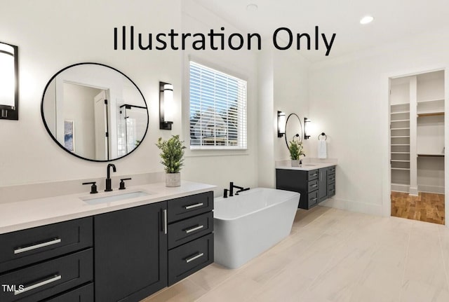 bathroom with vanity, tile patterned floors, and a bathtub