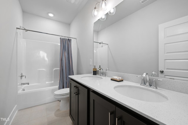 full bathroom with tile patterned flooring, vanity, shower / bath combo, and toilet