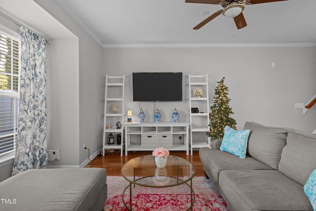 living room featuring ceiling fan, hardwood / wood-style floors, and ornamental molding