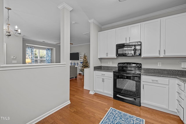 kitchen featuring white cabinets, black appliances, and light wood-type flooring