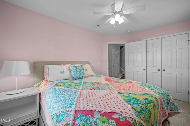 bedroom featuring carpet flooring, ceiling fan, and a closet