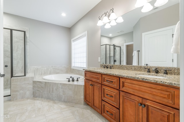 bathroom featuring tile patterned floors, vanity, and separate shower and tub