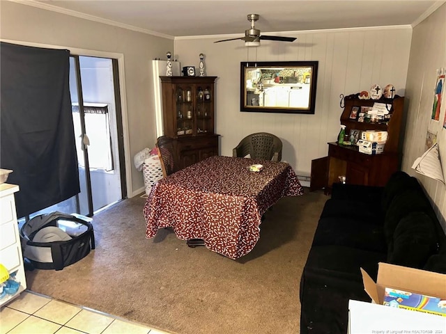 bedroom with ceiling fan, light colored carpet, and crown molding