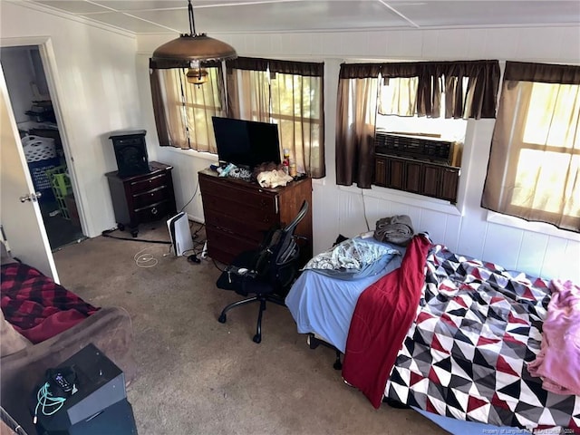 bedroom featuring cooling unit and ornamental molding