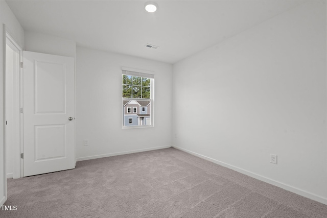 view of carpeted spare room