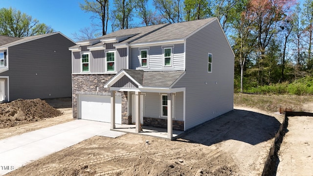 view of front of home with a garage