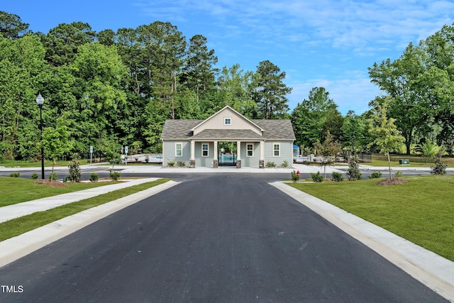 view of front of home with a front yard