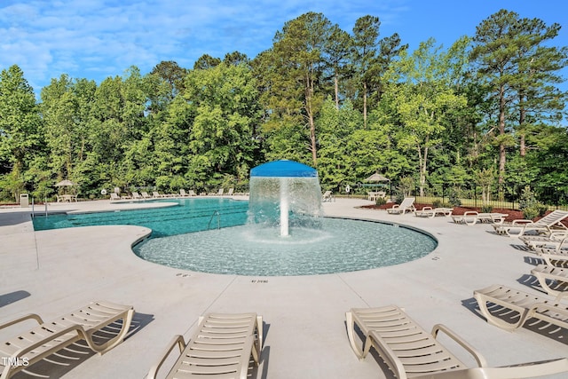 view of pool featuring a patio and pool water feature