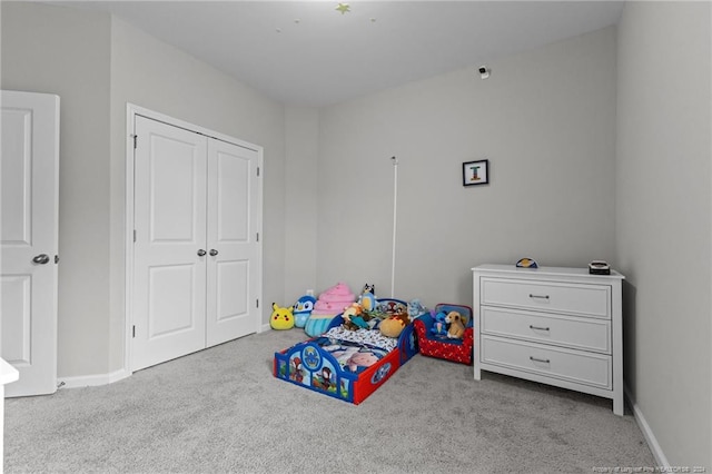 playroom featuring light carpet