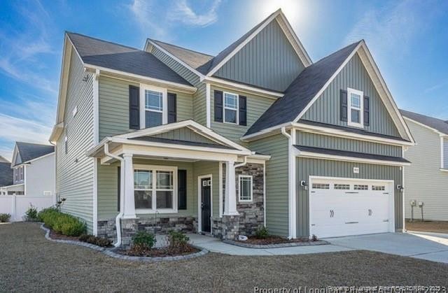 craftsman inspired home featuring a garage