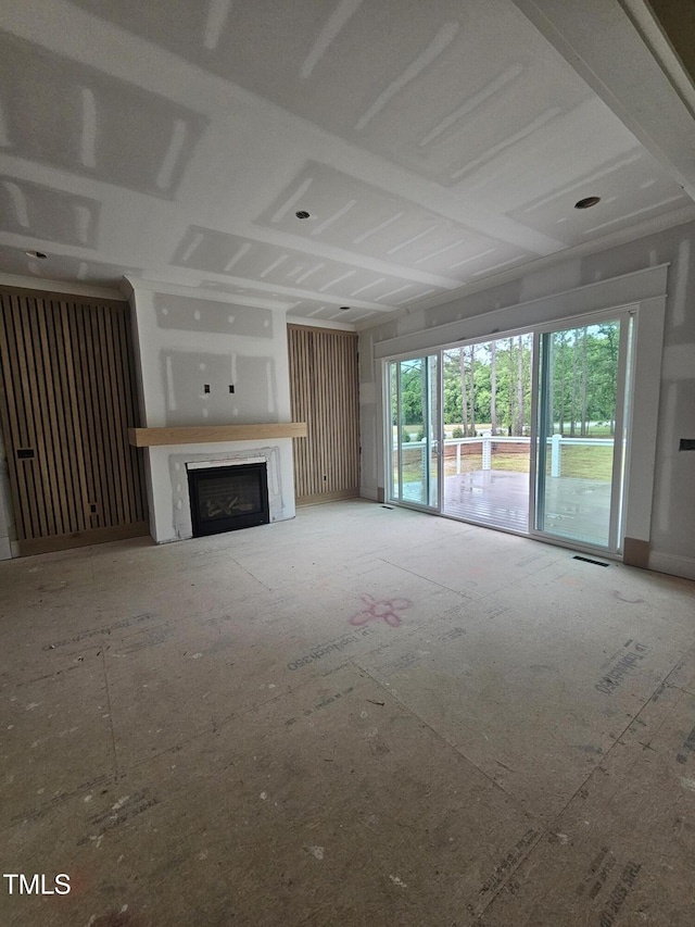 15 Independence Dr, Smithfield, NC 27577 - unfurnished living room featuring a fireplace