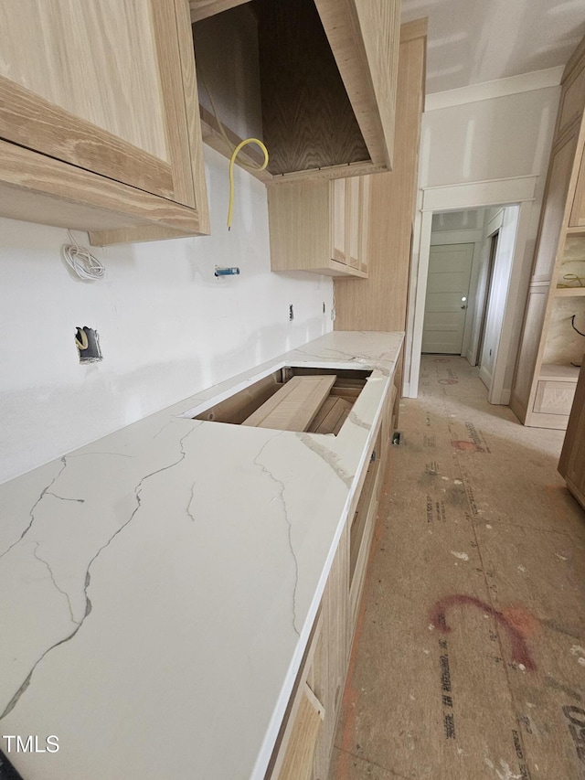 15 Independence Dr, Smithfield, NC 27577 - kitchen featuring light stone counters, wall chimney exhaust hood, and light brown cabinetry