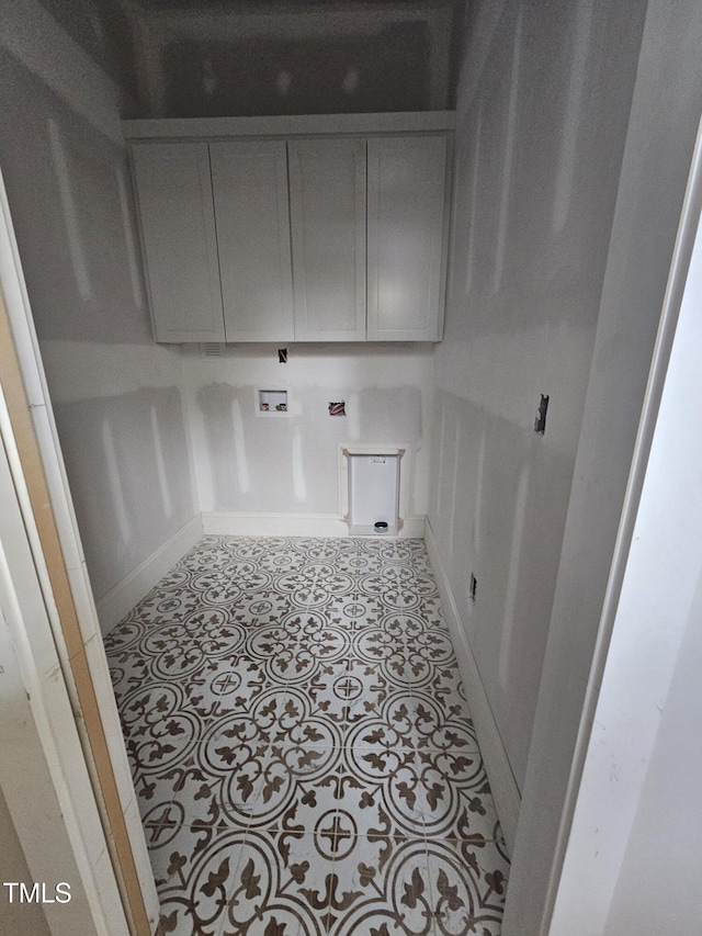 15 Independence Dr, Smithfield, NC 27577 - washroom with baseboards, cabinet space, and washer hookup
