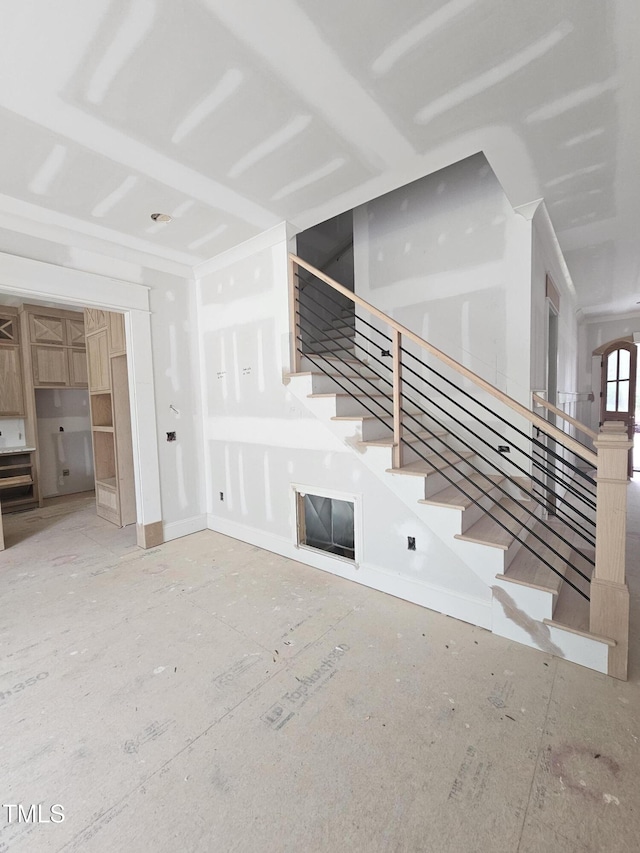 15 Independence Dr, Smithfield, NC 27577 - unfurnished living room with stairway