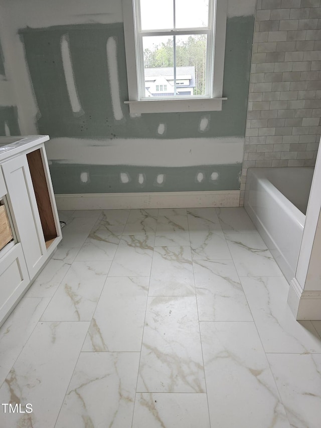 15 Independence Dr, Smithfield, NC 27577 - full bath featuring a bathing tub, vanity, and marble finish floor