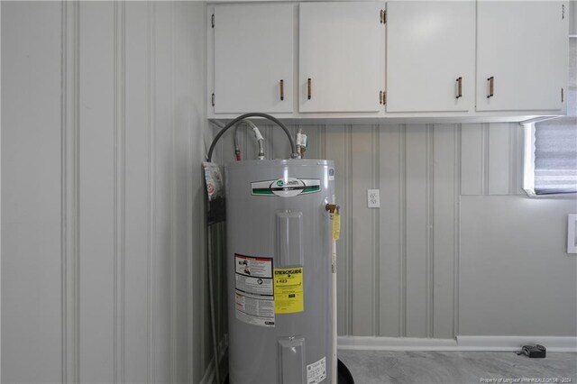 utility room featuring water heater