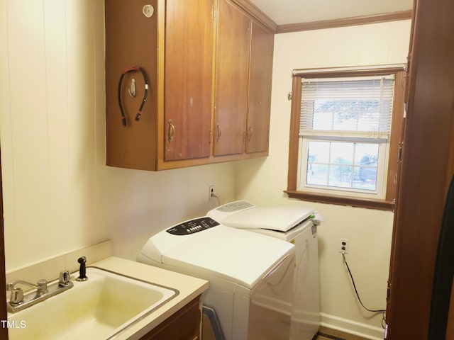 203 Green St, Fremont, NC 27830 - laundry area with cabinet space and washing machine and dryer