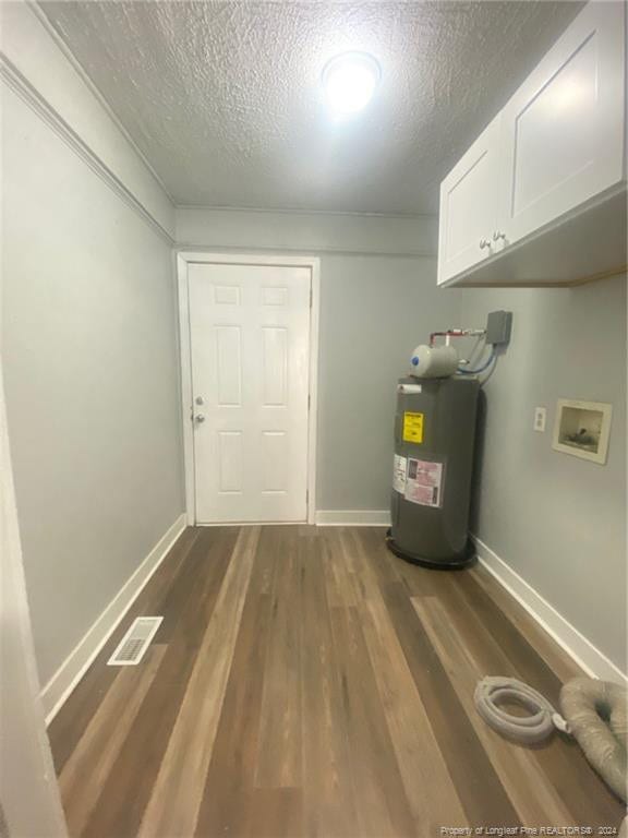 110 N Grove Ave, Rockingham, NC 28379 - utility room featuring electric water heater