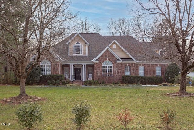 view of front of property with a front lawn