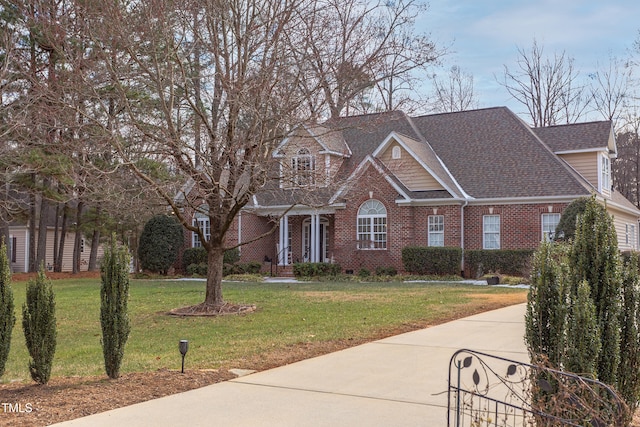 view of front of property with a front lawn