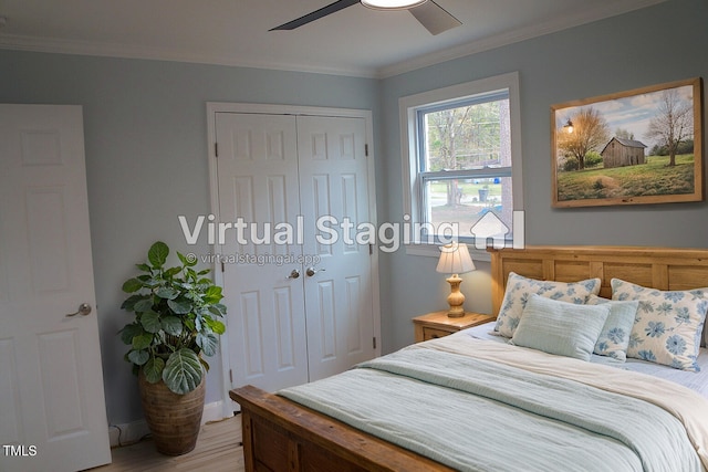 bedroom featuring ornamental molding, a ceiling fan, a closet, and wood finished floors