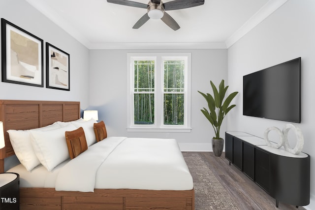 bedroom with ceiling fan, dark hardwood / wood-style flooring, and ornamental molding