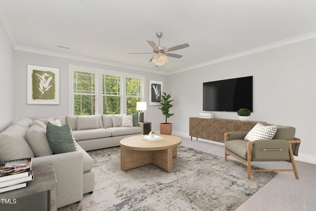 carpeted living room with ceiling fan and ornamental molding