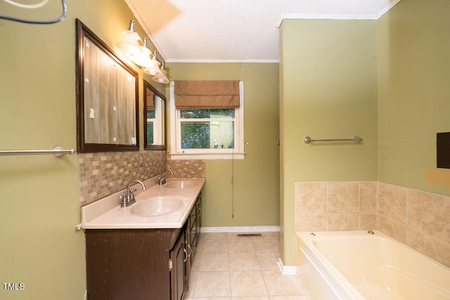 bathroom with a tub to relax in, crown molding, tile patterned flooring, and vanity