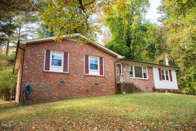 exterior space featuring a front lawn