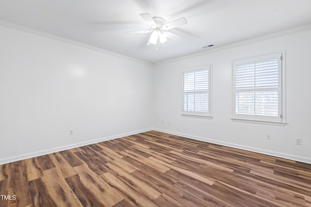 1321 Dylan Heath Ct, Raleigh, NC 27608 - empty room featuring crown molding, wood finished floors, and ceiling fan