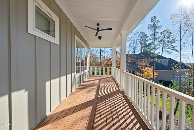 wooden terrace with ceiling fan