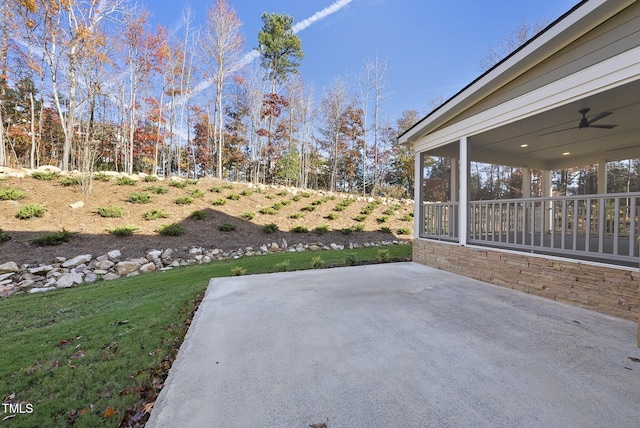 view of patio / terrace featuring ceiling fan