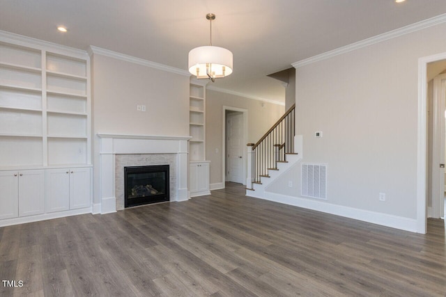 unfurnished living room featuring stairway, baseboards, visible vents, and dark wood-style flooring