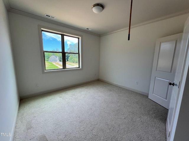 6040 Scalybark Rd, Durham, NC 27712 - spare room with ornamental molding, carpet floors, and baseboards