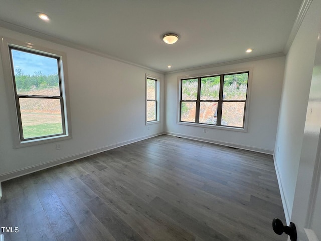 6040 Scalybark Rd, Durham, NC 27712 - unfurnished room with crown molding, baseboards, dark wood-style floors, and recessed lighting