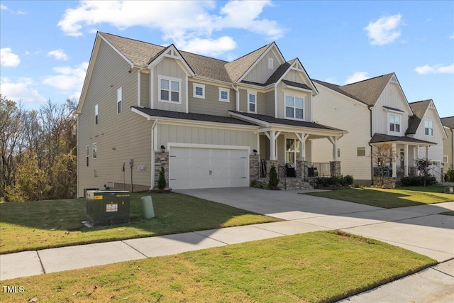 craftsman-style home featuring a front yard, a porch, and a garage