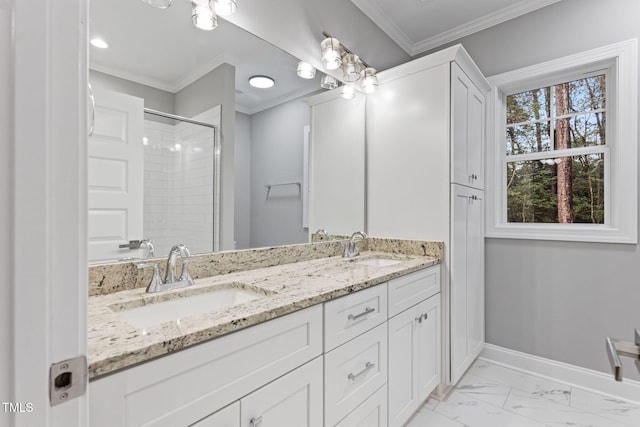 bathroom with vanity, crown molding, and walk in shower