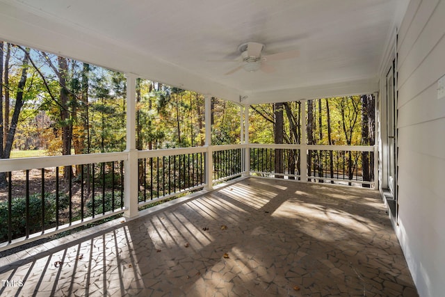 exterior space featuring ceiling fan