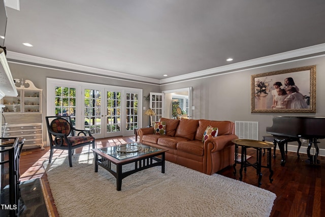 living room with crown molding, french doors, and dark wood-type flooring