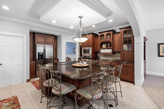 tiled dining room with crown molding