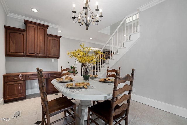 dining space featuring a chandelier, light tile patterned floors, and ornamental molding