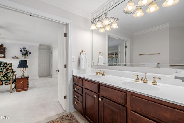 bathroom featuring a chandelier, vanity, and crown molding