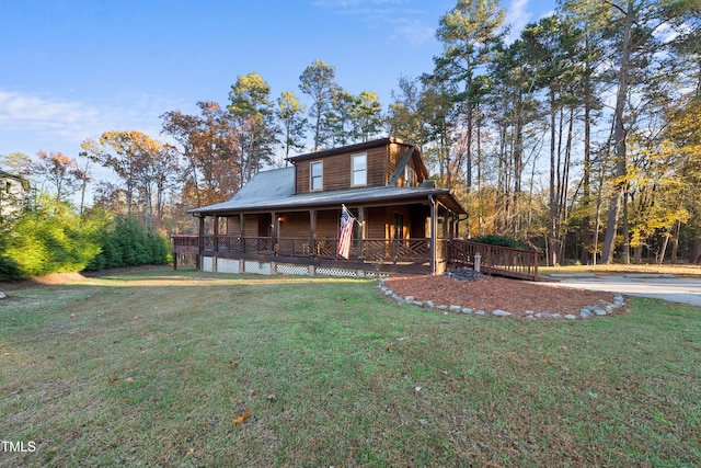 country-style home with covered porch and a front lawn