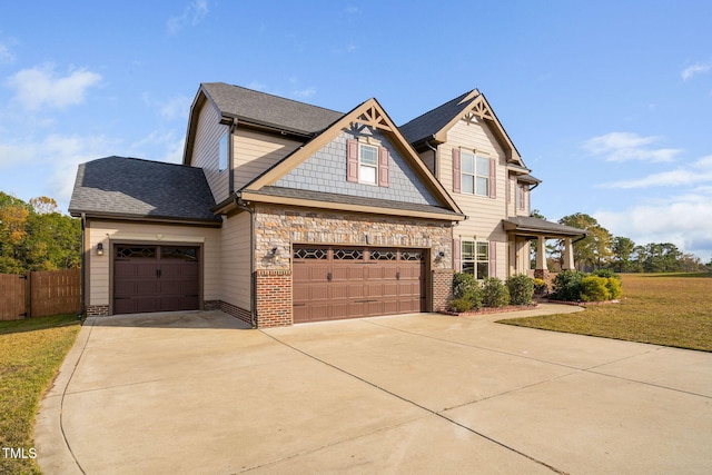 craftsman-style house with a front yard