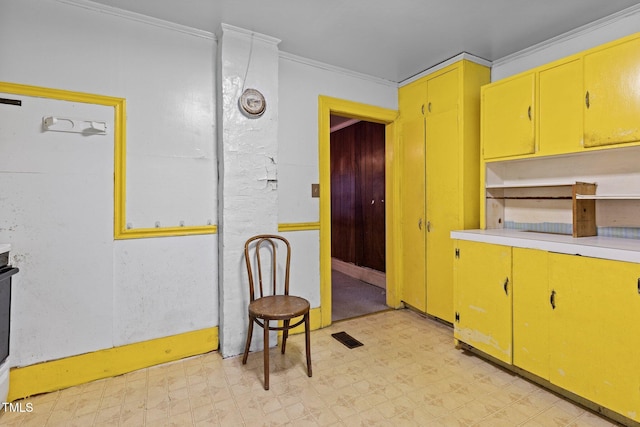 kitchen featuring crown molding