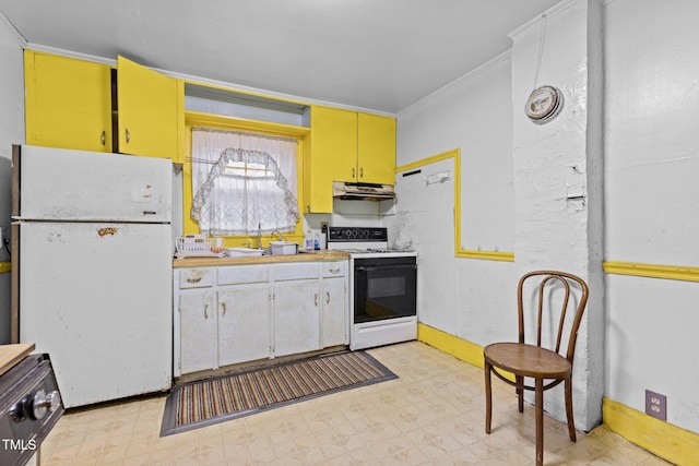 kitchen featuring white appliances, ornamental molding, and sink